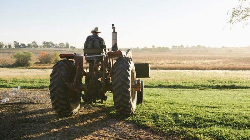 A farmer on a tractor