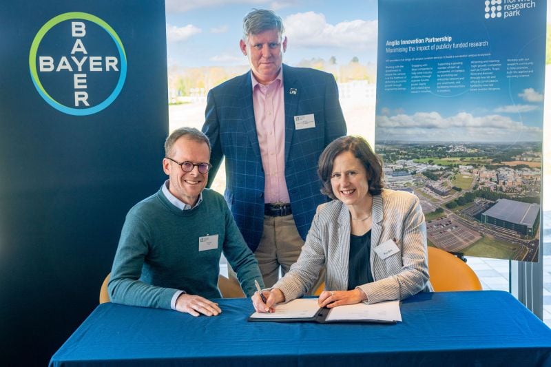 Dr Florian Jupe, Phil Taylor, and Roz Bird at the signing ceremony.