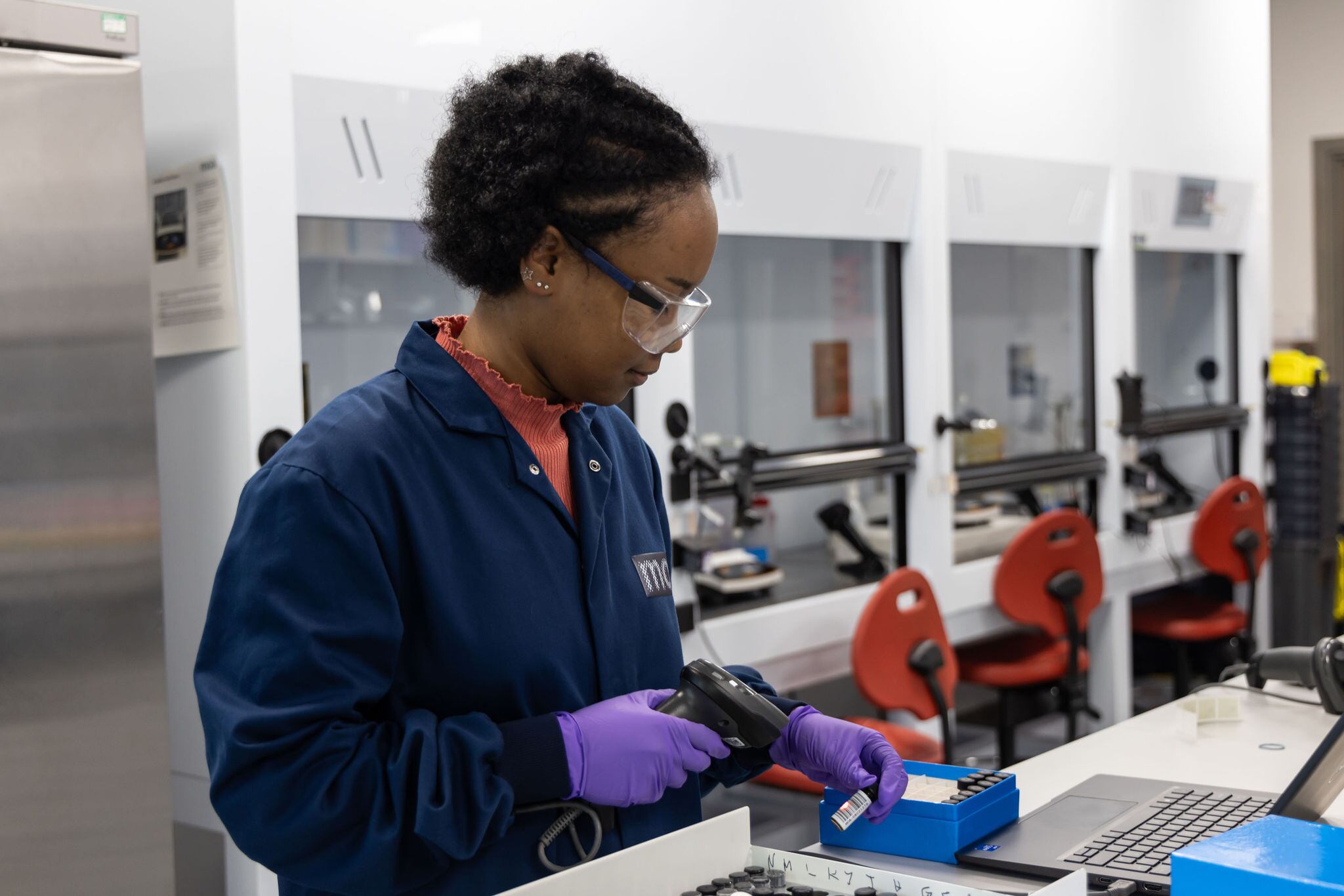 Moa scientist Zenita Mack scans vials of Moa herbicides in the company’s Oxford research laboratories.